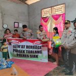 Berikan Bantuan Sembako Saat Jumat Berkah, Polsek Tualang Kunjungi Anak Yang Menderita Lumpuh di Kp. Ps. Timur