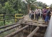 Sebelum Renovasi Jembatan Merah Putih, Kapolres Kampar Hadiri Doa Bersama di Desa Pulau Jambu